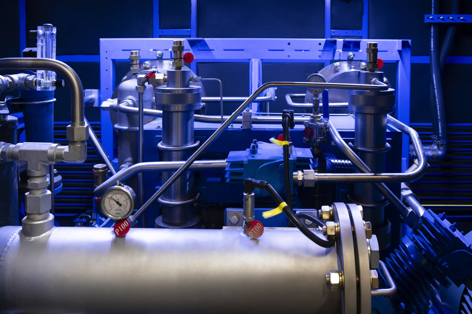 Stainless steel piping, gauges and process equipment in a helium handling system