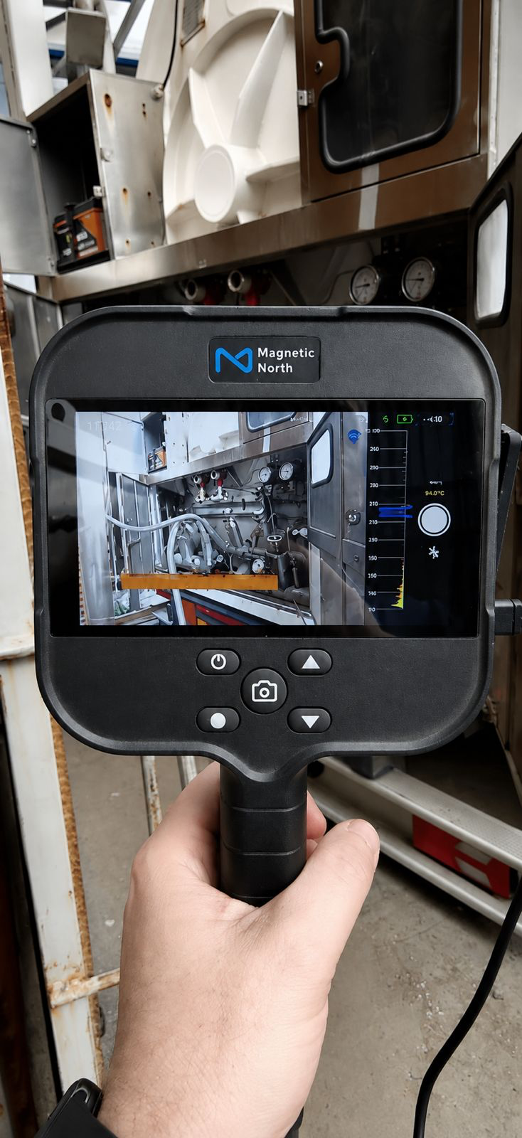 Acoustic imaging camera examining components inside industrial gas process equipment